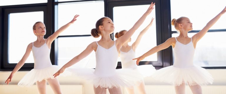 young ballerinas practicing a dance